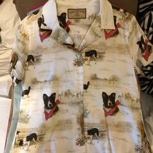 Women’s button up, short sleeve blouse. Size L perfect for a day on the farm.